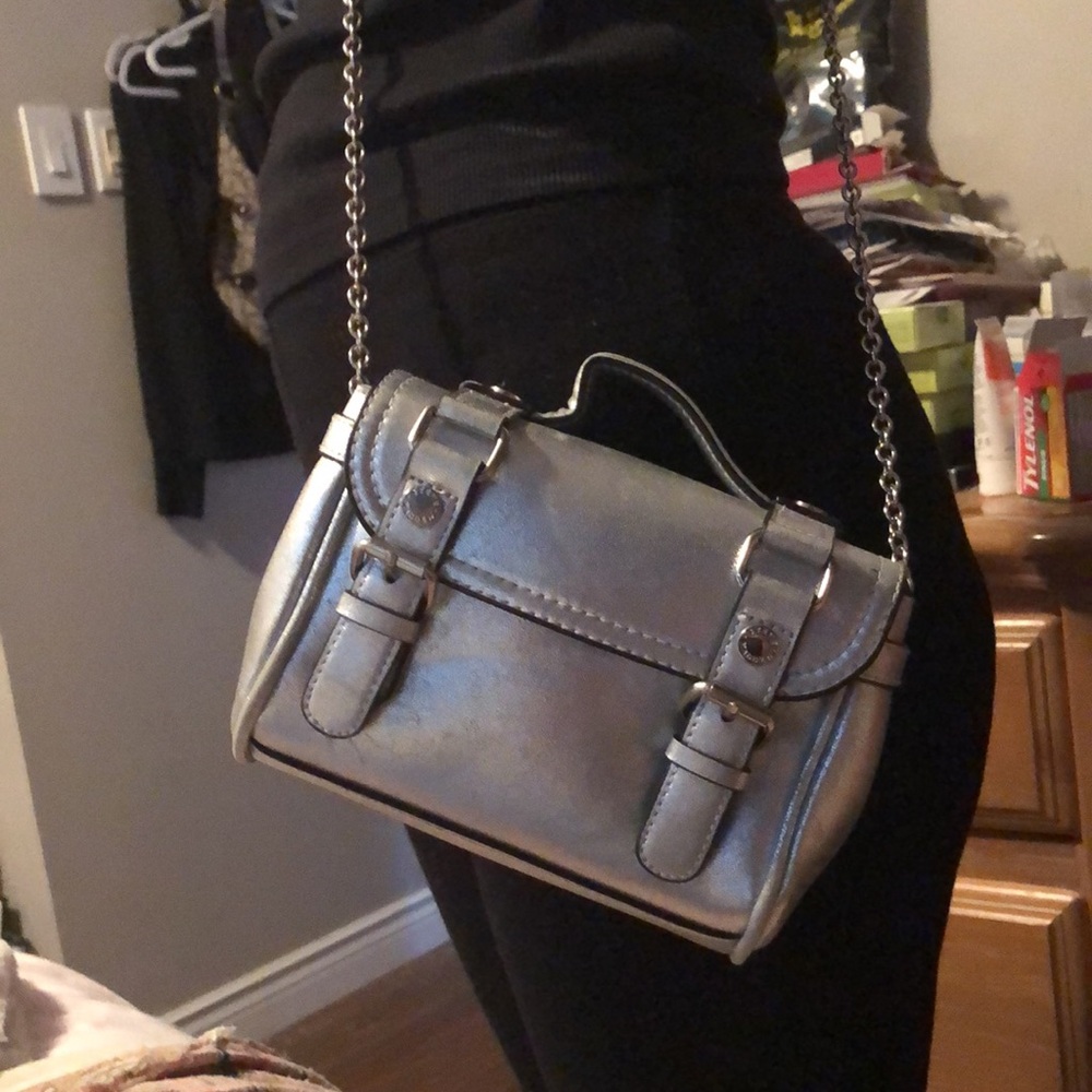Steve Madden Silver Crossbody Bag with Flap Closure and Buckle Accents